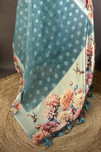 teal premium cotton blend printed saree with unstitched blouse piece.