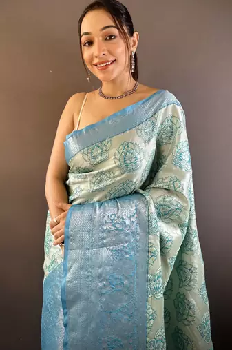 mint tissue silk blend kanjeevaram zari woven saree with unstitched blouse piece.