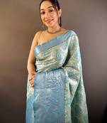 mint tissue silk blend kanjeevaram zari woven saree with unstitched blouse piece.