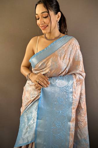 peach tissue silk blend kanjeevaram zari woven saree with unstitched blouse piece.