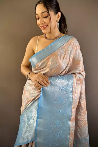 peach tissue silk blend kanjeevaram zari woven saree with unstitched blouse piece.