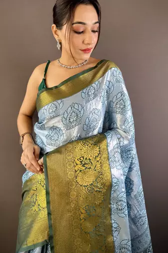 sky blue tissue silk blend kanjeevaram zari woven saree with unstitched blouse piece.