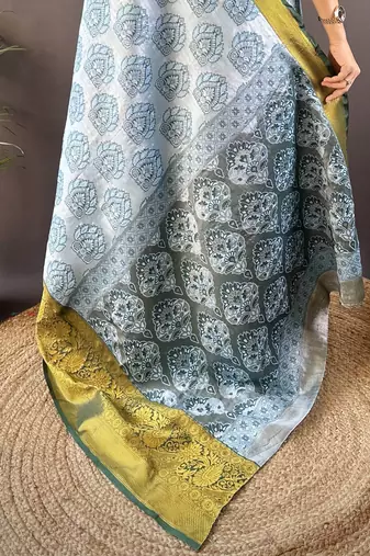 sky blue tissue silk blend kanjeevaram zari woven saree with unstitched blouse piece.