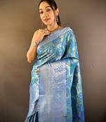 teal tissue silk blend kanjeevaram zari woven saree with unstitched blouse piece.