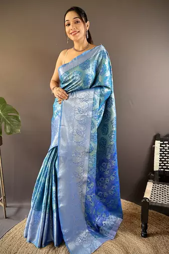 teal tissue silk blend kanjeevaram zari woven saree with unstitched blouse piece.