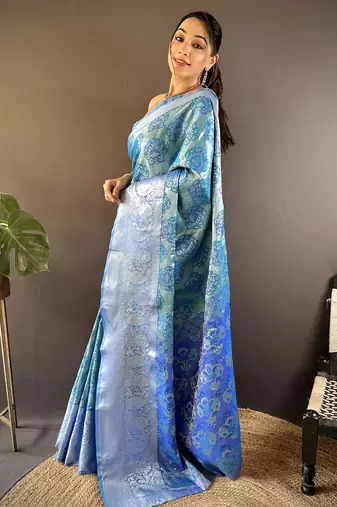 teal tissue silk blend kanjeevaram zari woven saree with unstitched blouse piece.