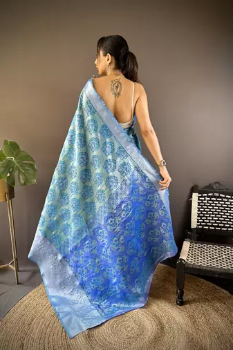 teal tissue silk blend kanjeevaram zari woven saree with unstitched blouse piece.