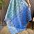 teal tissue silk blend kanjeevaram zari woven saree with unstitched blouse piece.