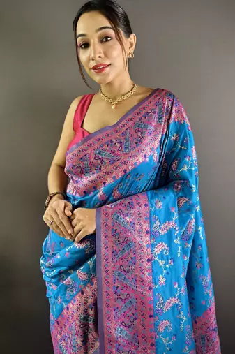 blue satin silk blend zari woven saree with unstitched blouse piece.