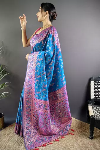 blue satin silk blend zari woven saree with unstitched blouse piece.