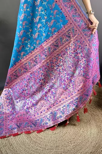 blue satin silk blend zari woven saree with unstitched blouse piece.