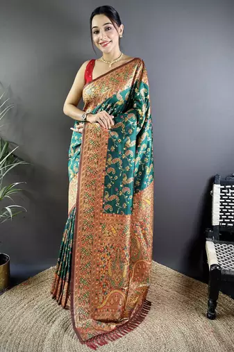 green satin silk blend zari woven saree with unstitched blouse piece.