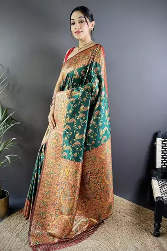 green satin silk blend zari woven saree with unstitched blouse piece.