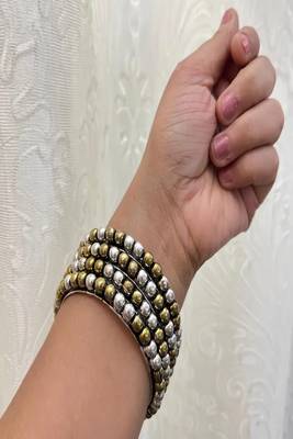 Dual tone bangle set: oxidized german silver, gold plated 1