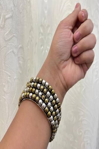 Dual tone bangle set: oxidized german silver, gold plated