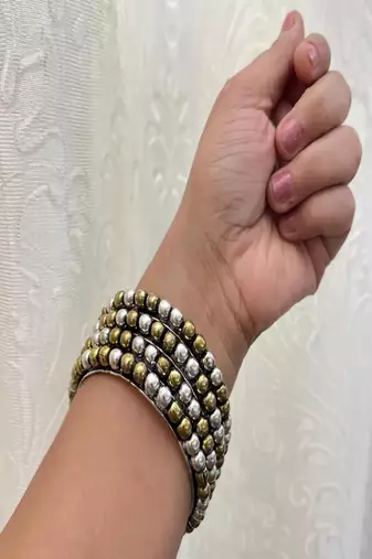Dual tone bangle set: oxidized german silver, gold plated