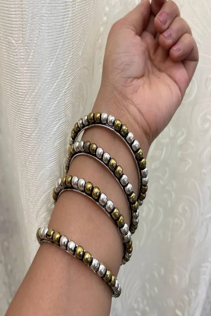 Dual tone bangle set: oxidized german silver, gold plated
