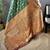 green satin silk blend zari woven saree with unstitched blouse piece.