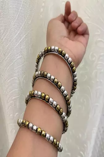 Dual tone bangle set: oxidized german silver, gold plated