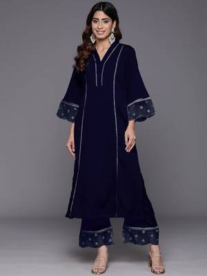 Women Solid Kurta with Trousers 1