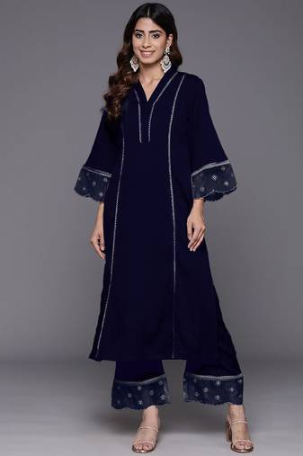 Women Solid Kurta with Trousers