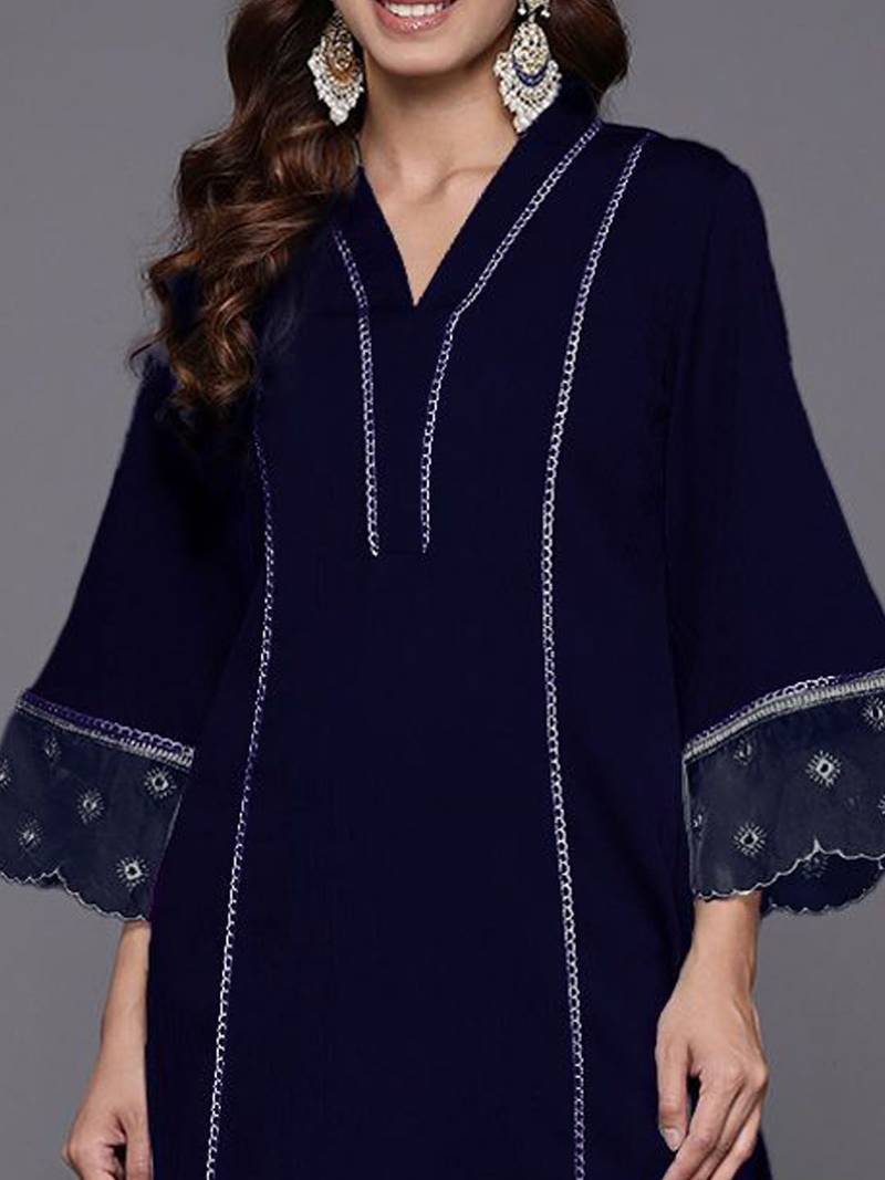 Women Solid Kurta with Trousers