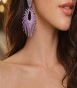 Sparkling fuchsia sunburst statement earrings | rhodium plated chandelier earrings