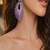 Sparkling fuchsia sunburst statement earrings | rhodium plated chandelier earrings