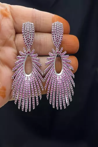 Sparkling fuchsia sunburst statement earrings | rhodium plated chandelier earrings