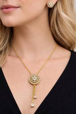 Gold crystal pendant necklace and tassel earrings set 1