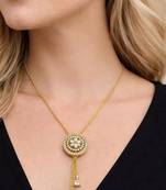 Gold crystal pendant necklace and tassel earrings set