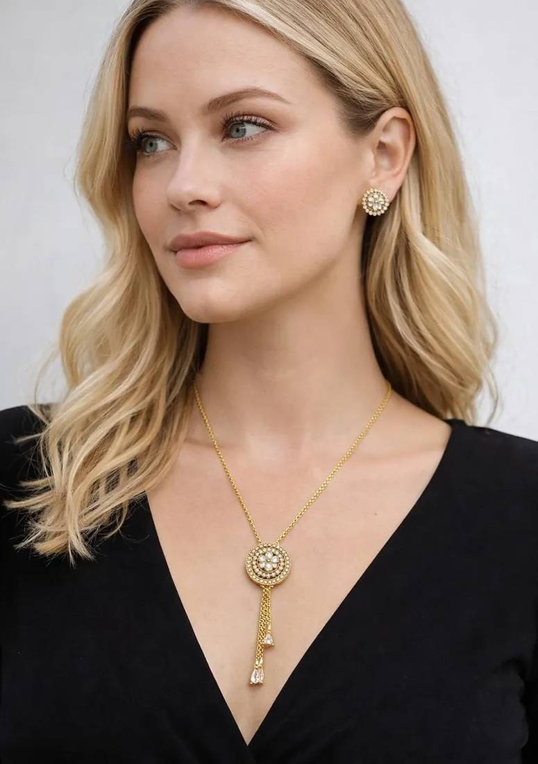 Gold crystal pendant necklace and tassel earrings set