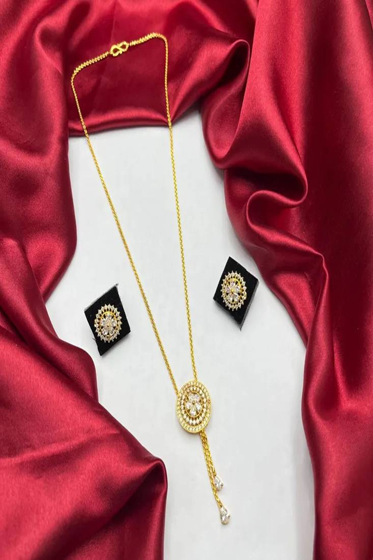 Gold crystal pendant necklace and tassel earrings set