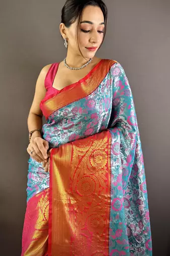 teal tissue silk blend kanjeevaram zari woven saree with unstitched blouse piece.