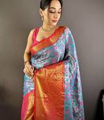 teal tissue silk blend kanjeevaram zari woven saree with unstitched blouse piece.