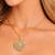 Gold filigree medallion jewelry set: concentric circles, lattice design necklace, earrings