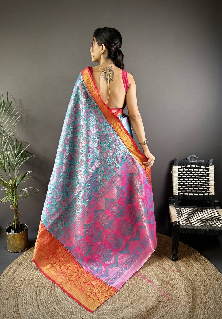teal tissue silk blend kanjeevaram zari woven saree with unstitched blouse piece.