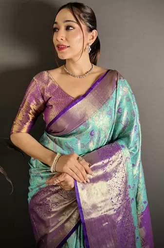 blue kanjeevaram silk blend zari woven saree with unstitched blouse piece.