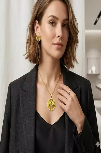 Gold plated sunburst jewelry set: floral pendant necklace, black stone earrings