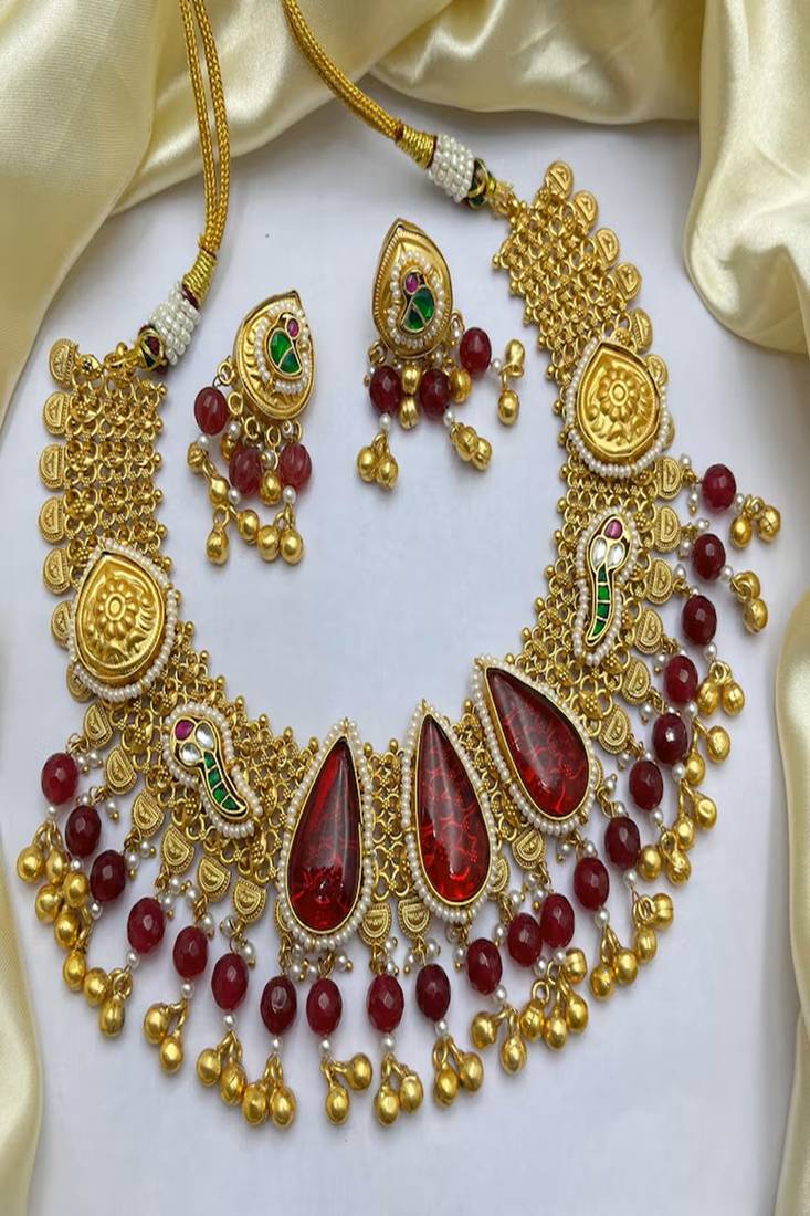 Antique gold kundan choker necklace set with ruby red stones