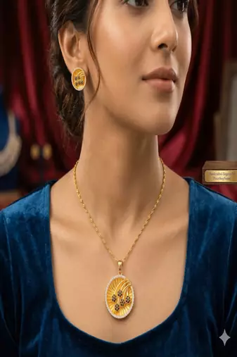 Gold plated sunburst jewelry set: floral pendant necklace, black stone earrings