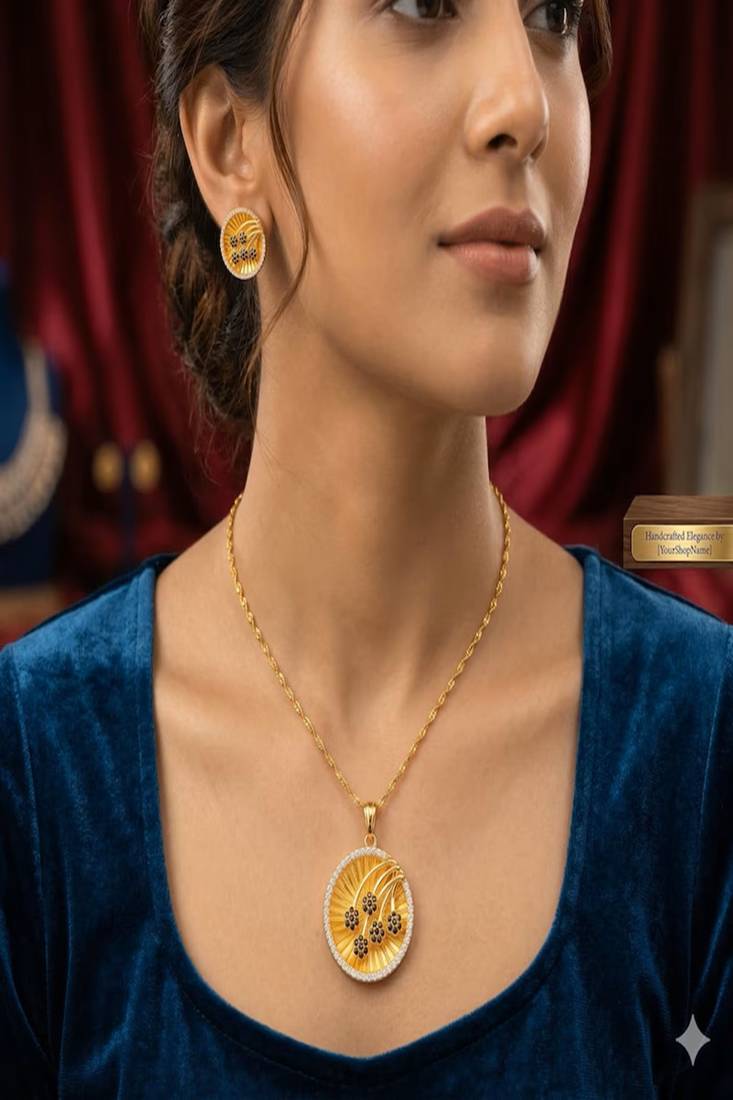 Gold plated sunburst jewelry set: floral pendant necklace, black stone earrings