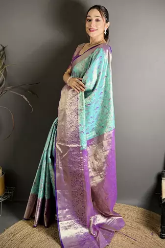 blue kanjeevaram silk blend zari woven saree with unstitched blouse piece.