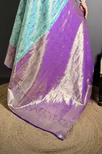 blue kanjeevaram silk blend zari woven saree with unstitched blouse piece.