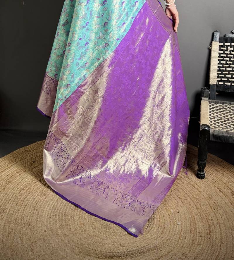 blue kanjeevaram silk blend zari woven saree with unstitched blouse piece.
