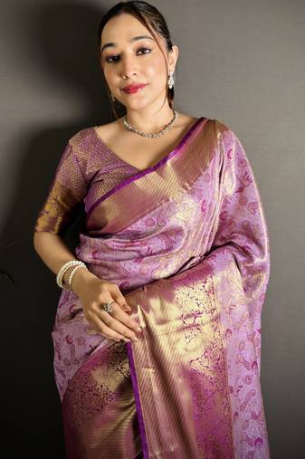 lavender kanjeevaram silk blend zari woven saree with unstitched blouse piece.