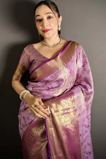 lavender kanjeevaram silk blend zari woven saree with unstitched blouse piece.