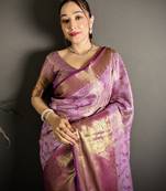 lavender kanjeevaram silk blend zari woven saree with unstitched blouse piece.