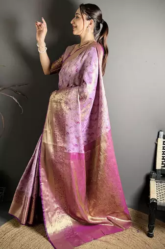 lavender kanjeevaram silk blend zari woven saree with unstitched blouse piece.