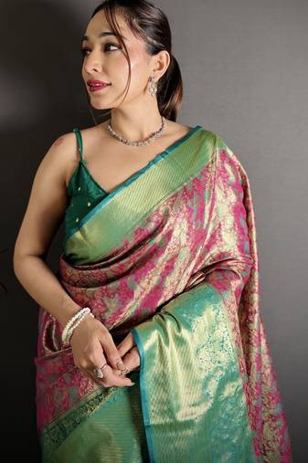 rust kanjeevaram silk blend zari woven saree with unstitched blouse piece.